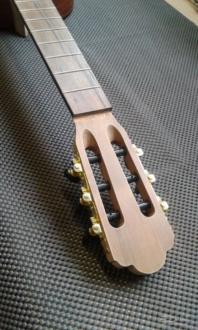 tête cassée guitare